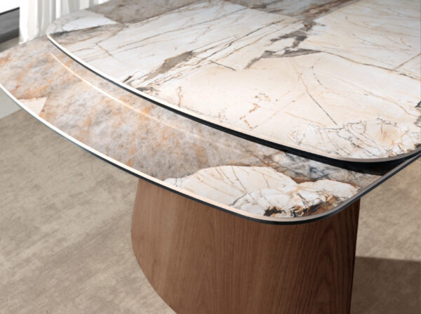 Mesa comedor extensible ovalada barril mármol porcelánico y nogal