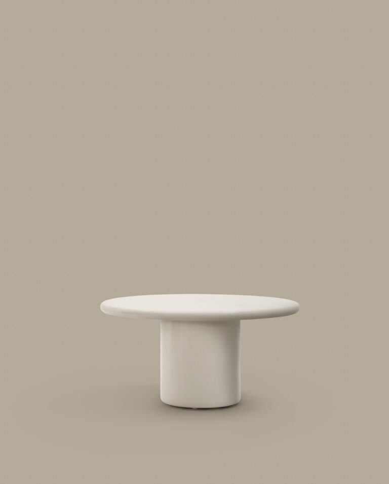 Mesa redonda Canaret de cemento con acabado blanco brillante Ø 152 cm
