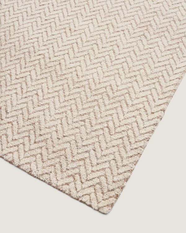 Alfombra Calira de lana jacquard trenzado beige 230 x 160 cm